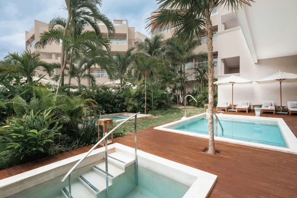 Private outdoor pool and tropical garden area at Almare, a Luxury Collection Resort, Isla Mujeres, an adults-only all-inclusive resort near Cancun.