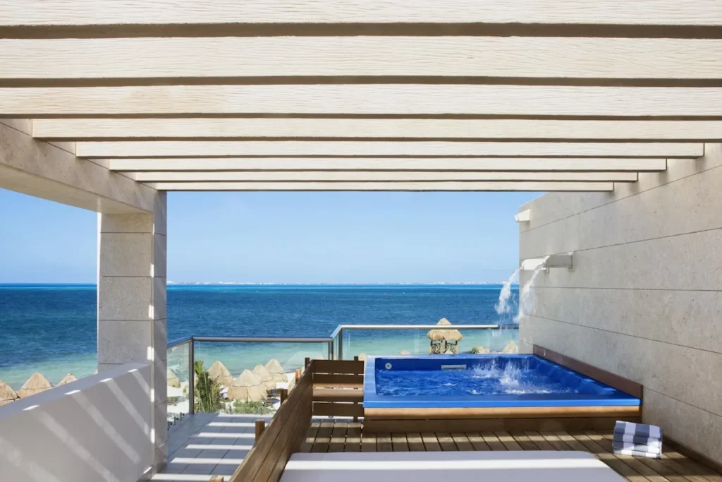 Private hot tub on a terrace overlooking the ocean at Beloved Playa Mujeres in Cancun