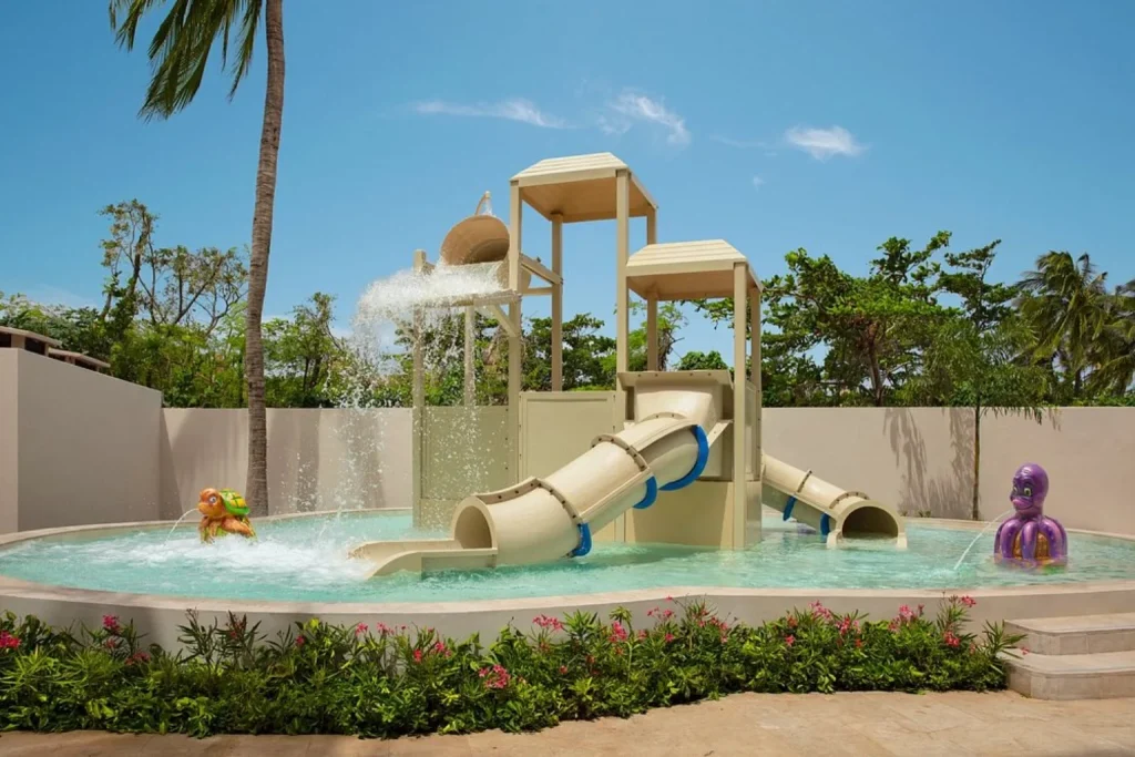 Kids’ water play area with slides and splash features at Dreams Aventuras Riviera Maya, Mexico