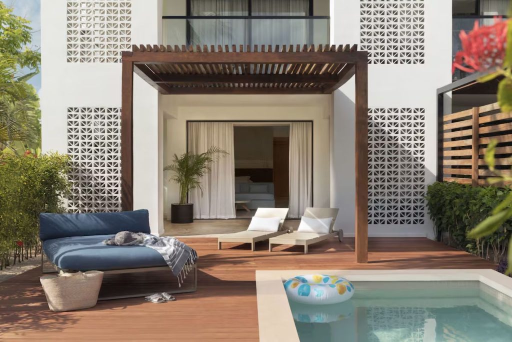 Modern suite featuring a private terrace with a plunge pool at Finest Playa Mujeres in Cancun, Mexico.