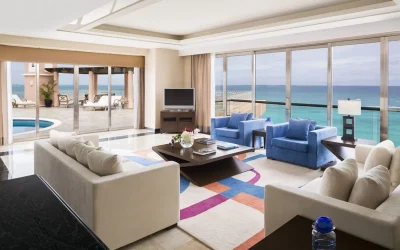 Oceanfront suite with a spacious living area at Grand Fiesta Americana Coral Beach in Cancún.