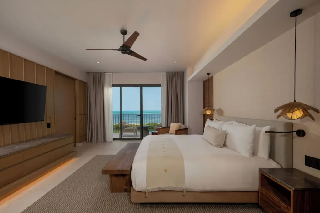 Ocean view king guest room with a private balcony at Grand Hyatt Cancun Beach Resort in Cancún, Mexico.