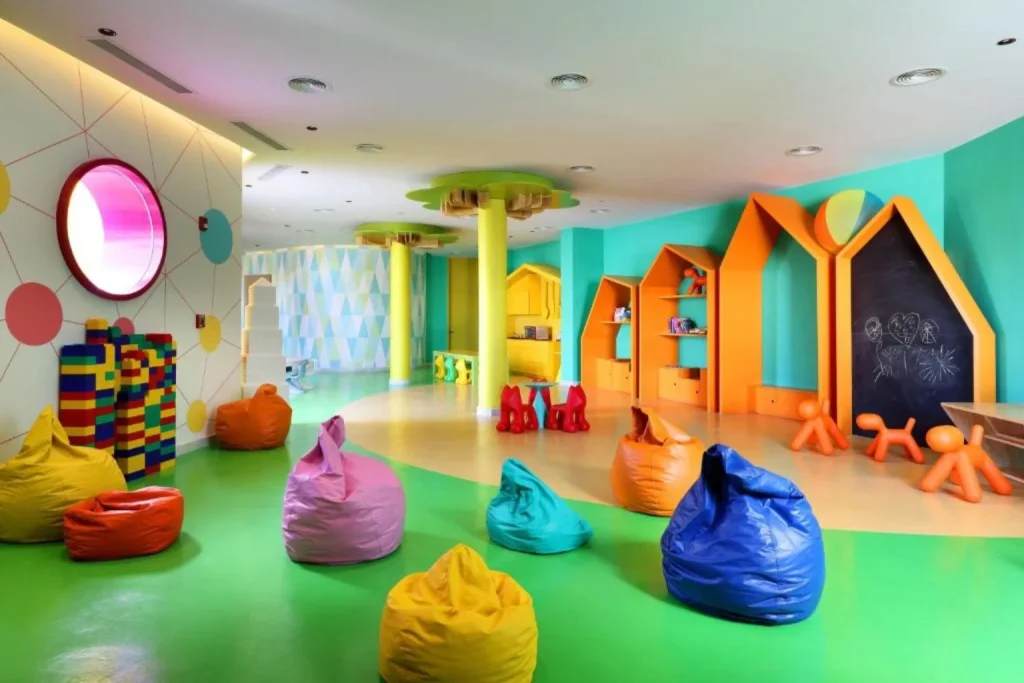 Colorful kids’ playroom with bean bags and play areas at Grand Palladium Costa Mujeres Resort & Spa, Mexico