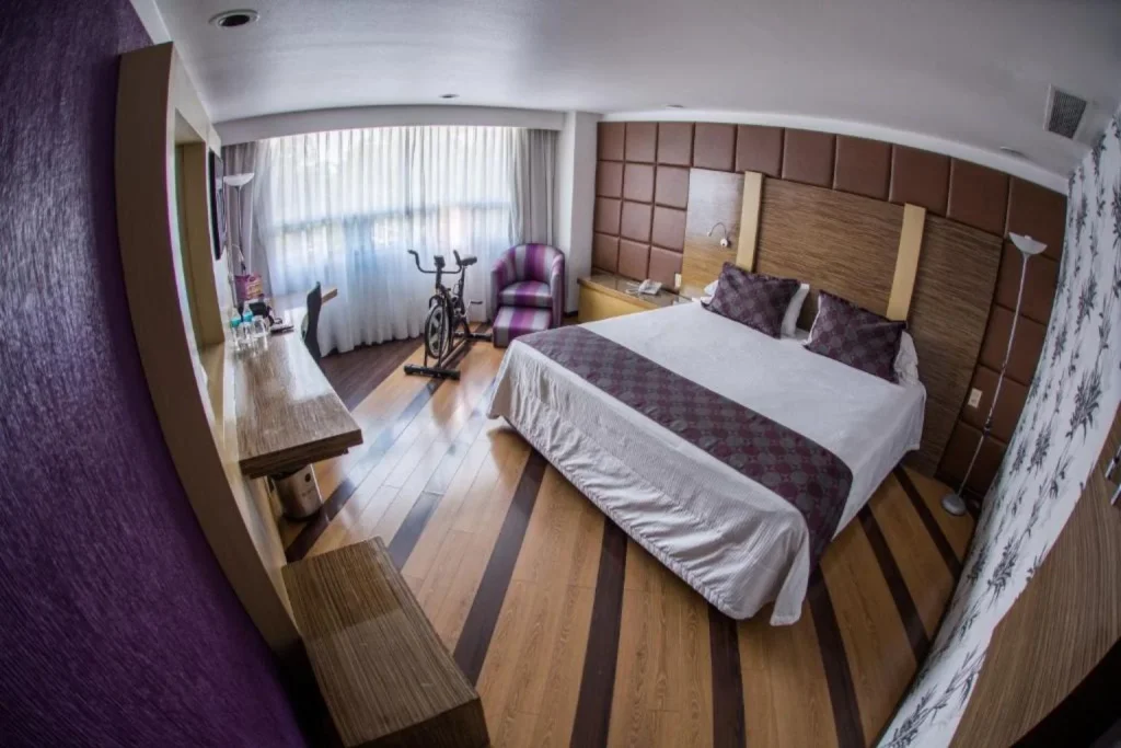 King guest room at Grand Prix-WeEnjoyHotels-Aeropuerto in Cancún, Mexico.