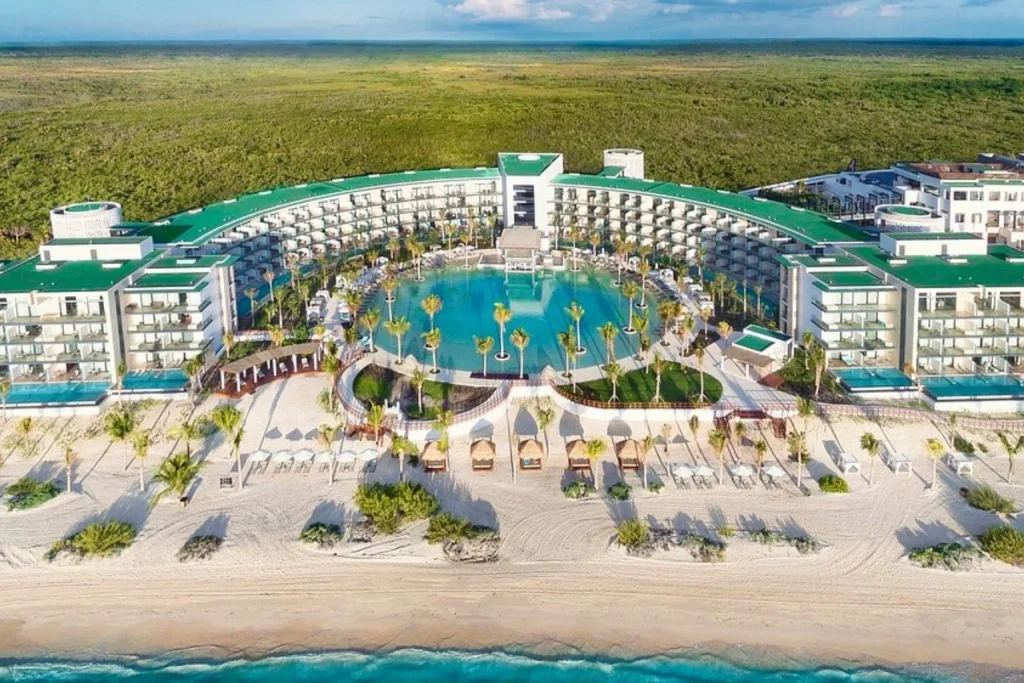 Beachfront resort with a large central pool and tropical gardens at Haven Riviera Cancun in Cancun