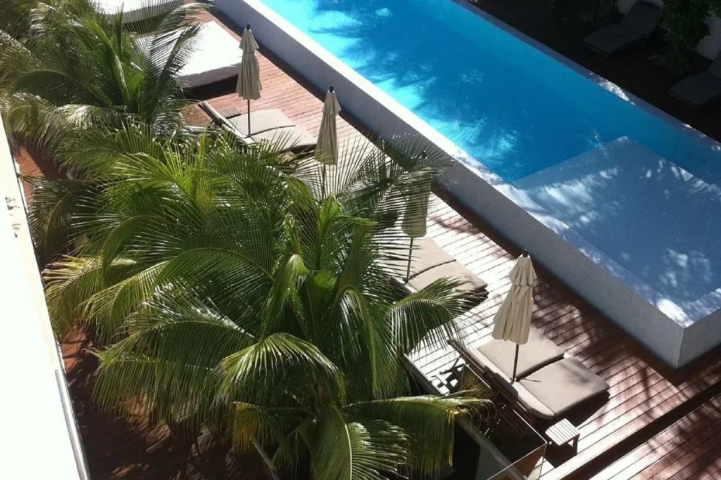 Beachfront infinity pool with ocean views at Hotel Secreto Isla Mujeres near Cancun