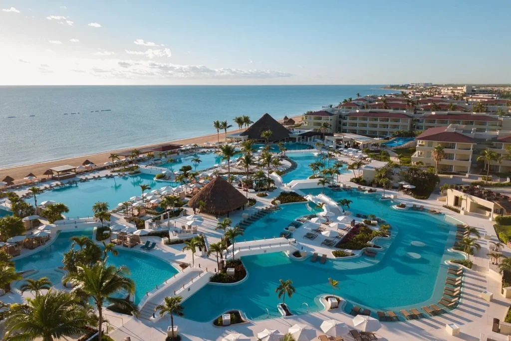 Aerial view of swimming pools and beachfront at Moon Palace Cancun in Cancun