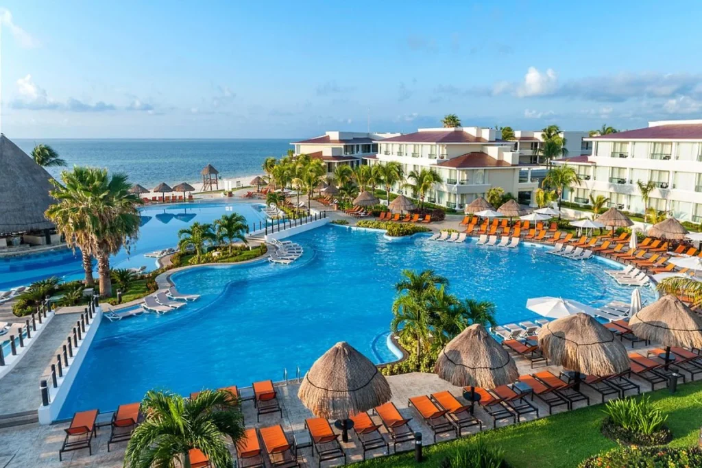 Aerial view of the oceanfront swimming pools at Moon Palace Cancun – Nizuc & Sunrise in Cancún, Mexico.