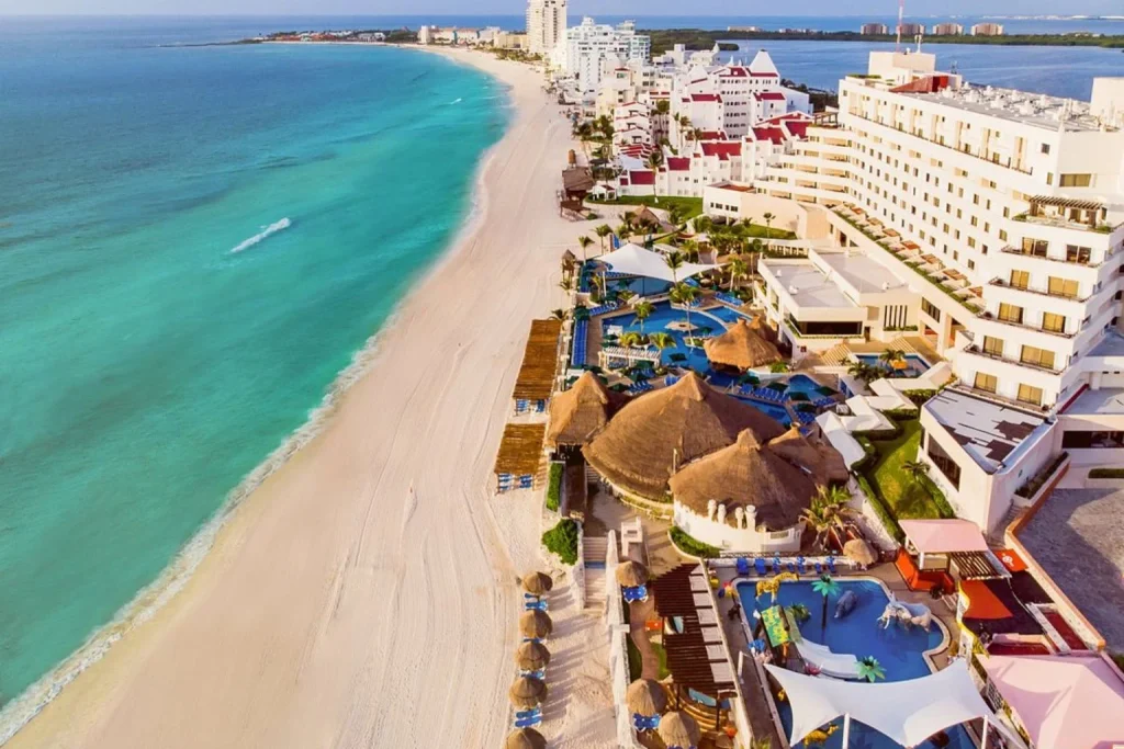 Beachfront pools and Caribbean beach at Royal Solaris Cancun in Cancún, Mexico.