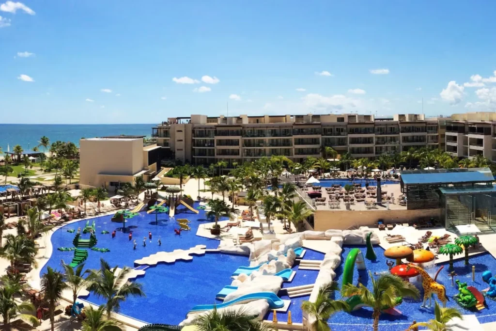 Pools and kids’ water play area with slides at Royalton Riviera Cancun, Mexico