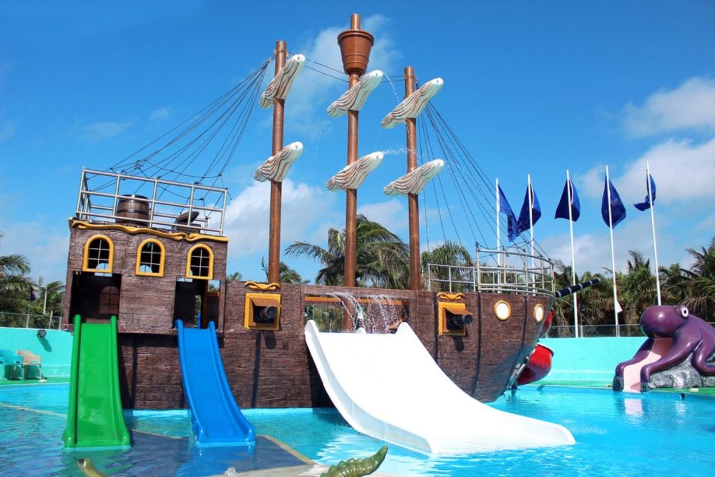 Seadust Cancun Family Resort pirate ship water play area with slides and pool