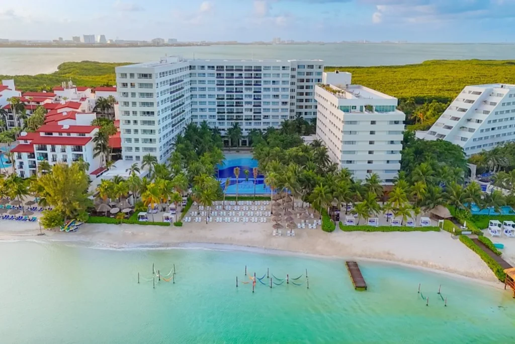 Aerial view of The Sens Cancun beachfront resort and Caribbean Sea