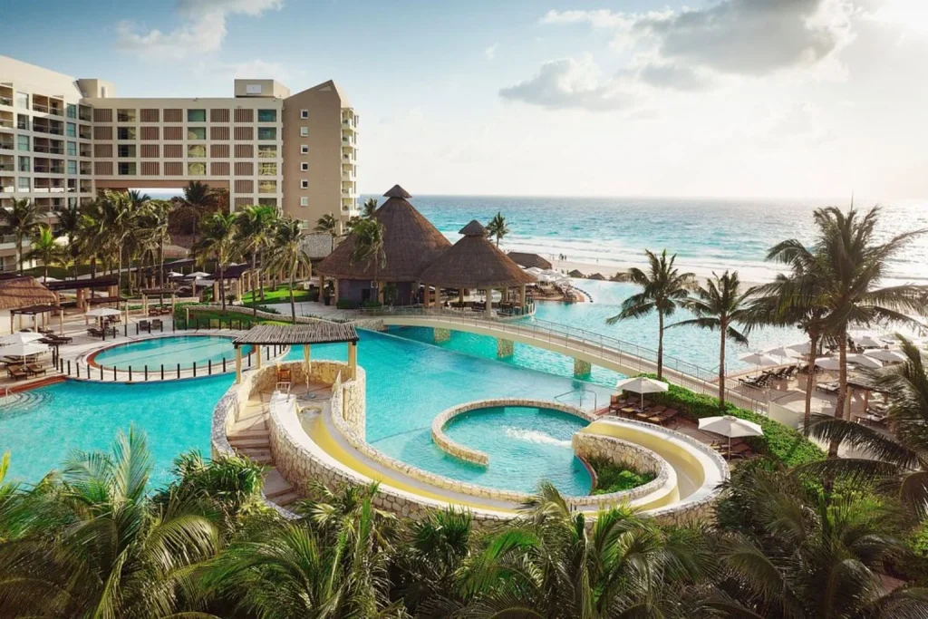 Resort pools overlooking the beachfront at The Westin Lagunamar Ocean Resort Villas & Spa.