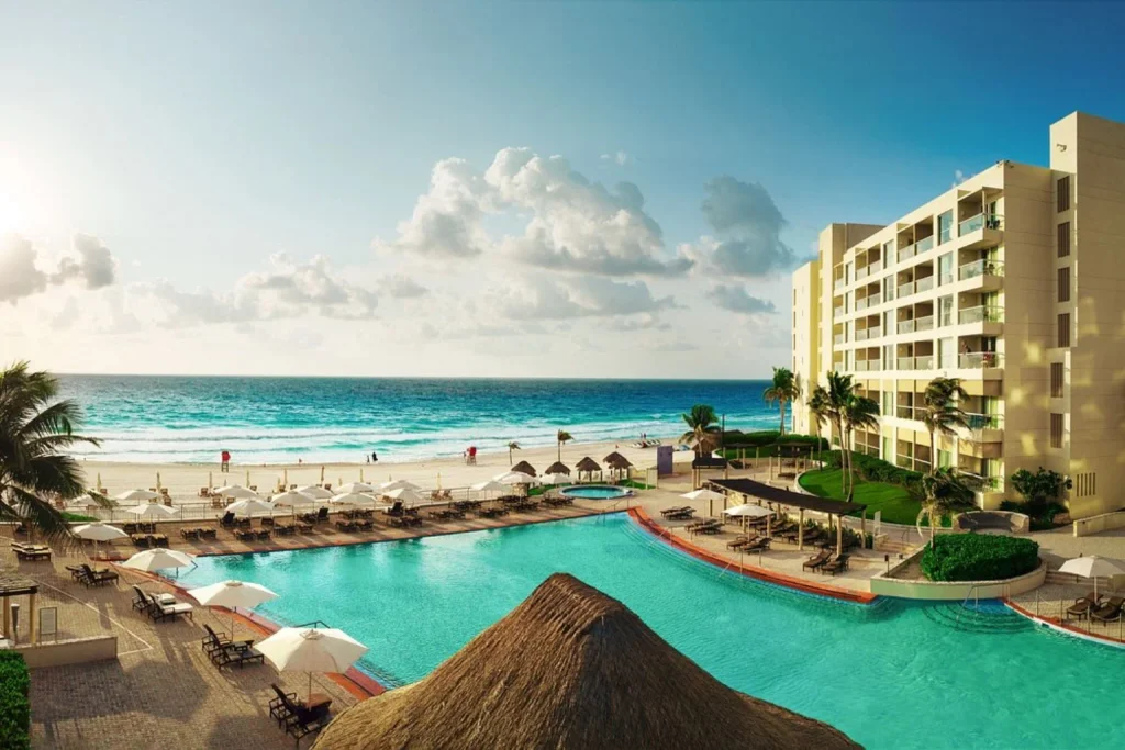 Large beachfront swimming pool overlooking the Caribbean Sea at Westin Lagunamar Ocean Resort Villas & Spa in Cancun